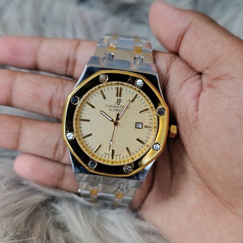 Sophisticated AP Royal Oak two-tone luxury watch for men featuring stainless steel and gold bracelet with yellow textured dial.