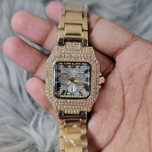 Elegant iced out Mariga Carter women’s watch worn for formal wear