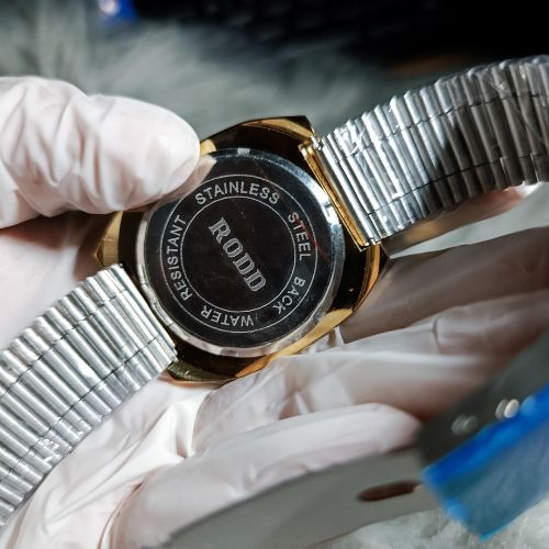 Rodd Classic Gold Dial Watch worn on wrist in a formal lifestyle setting