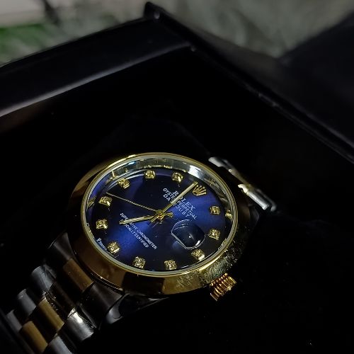 Close-up of Rolex Oyster Perpetual watch showing date feature