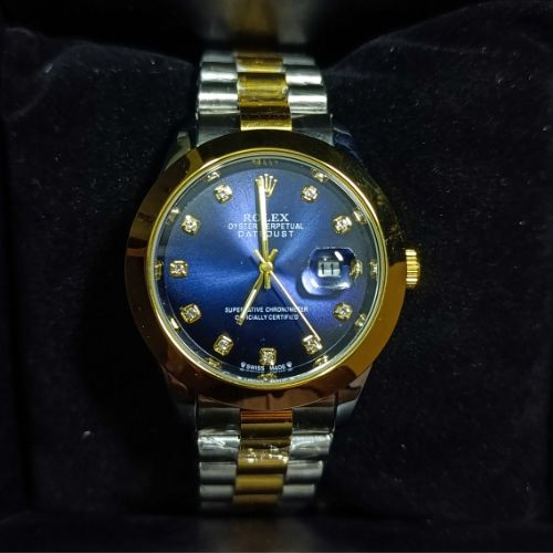 Detailed dial of Rolex Oyster Perpetual with luminous markers