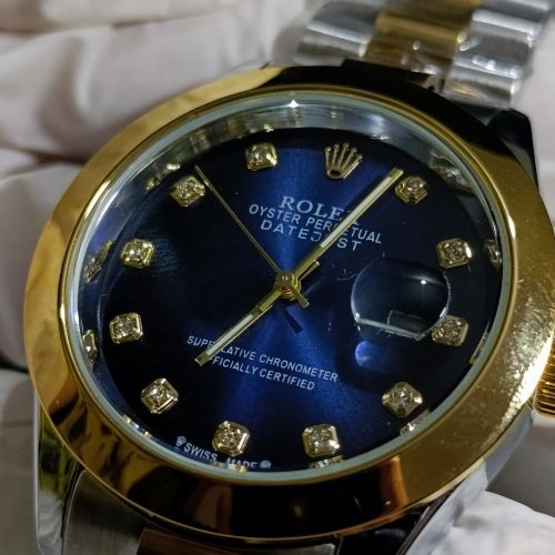 Rolex Oyster Perpetual men’s watch worn on wrist for size reference