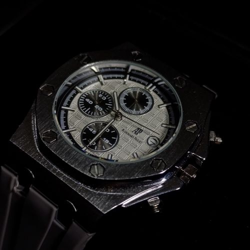 Side profile of Royal Oak white dial chronograph watch showing iconic octagonal bezel