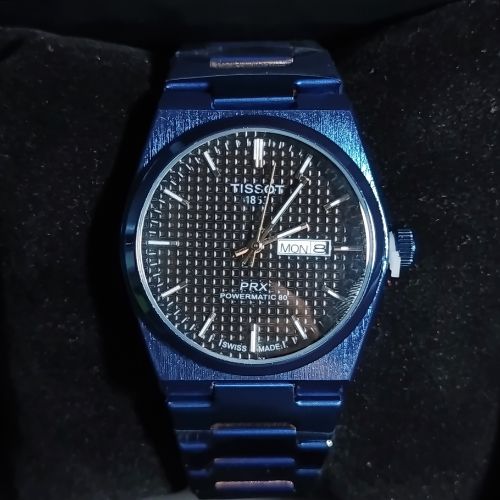 Tissot PRX 1853 all blue men’s watch worn on wrist for style display